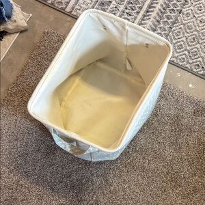 Cream and bluish green storage basket